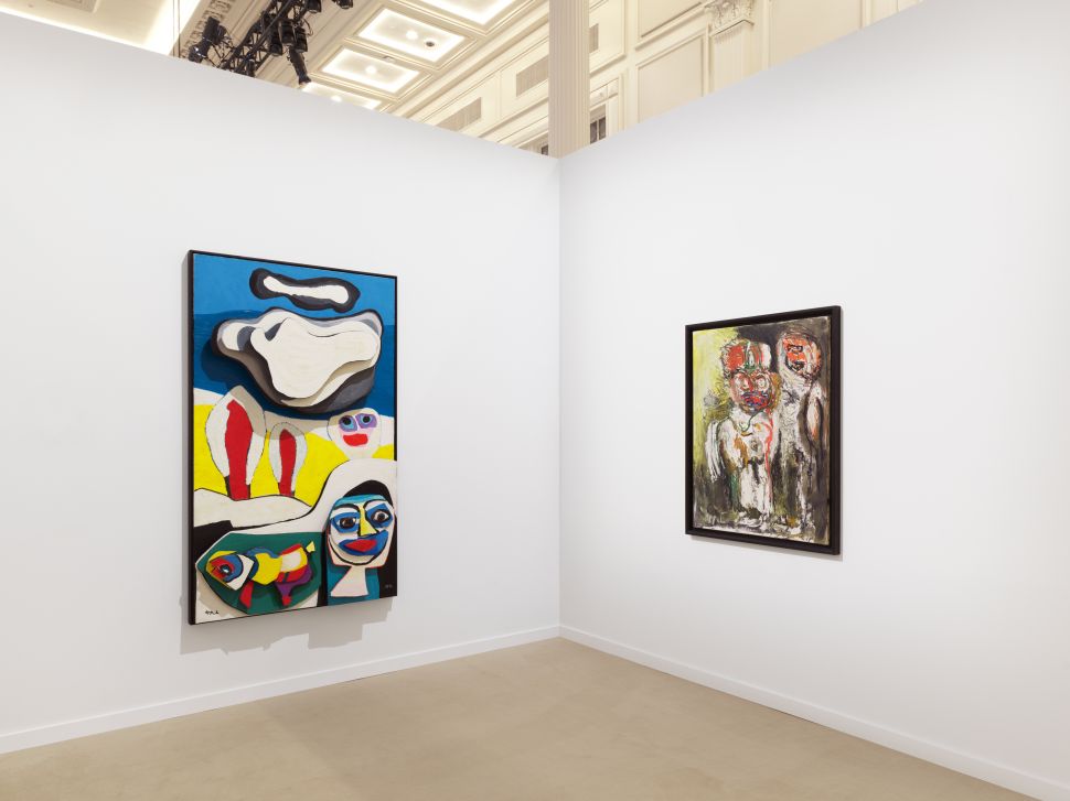 Image of a fair booth with colorful paintings on relief 